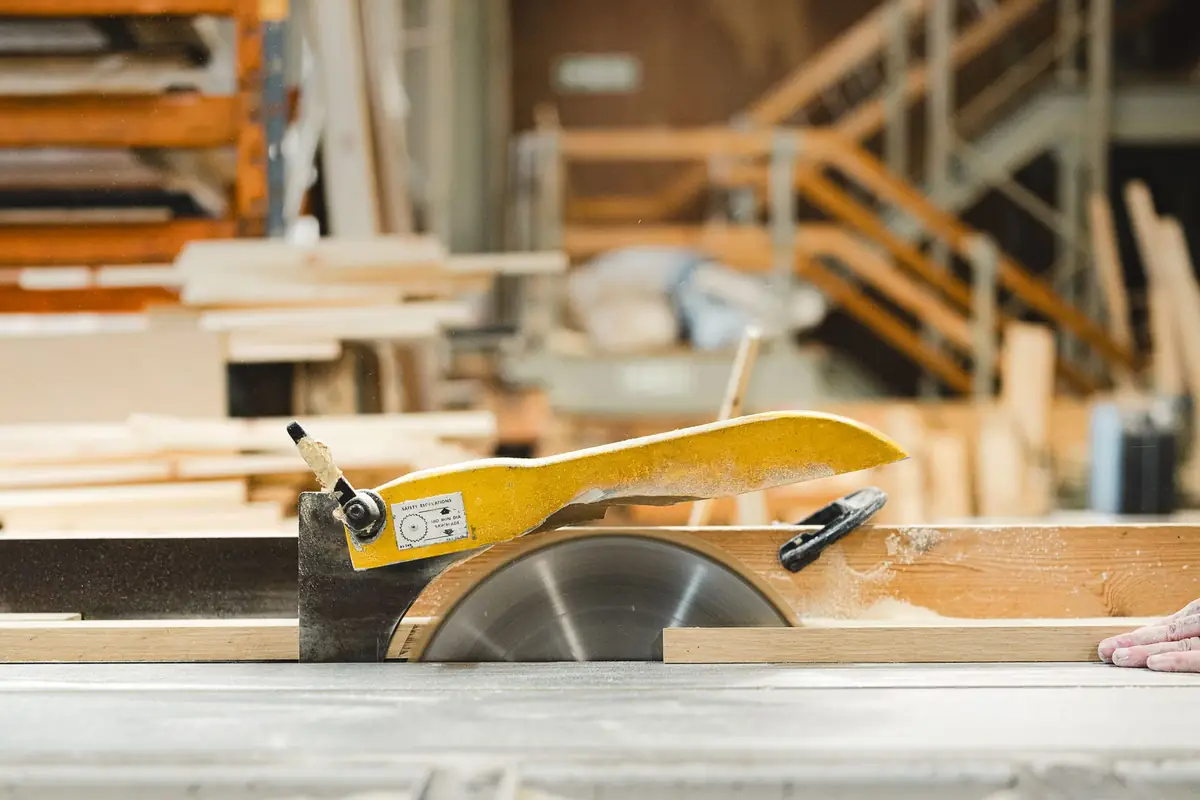 A power saw on a bench in a woodworking shop