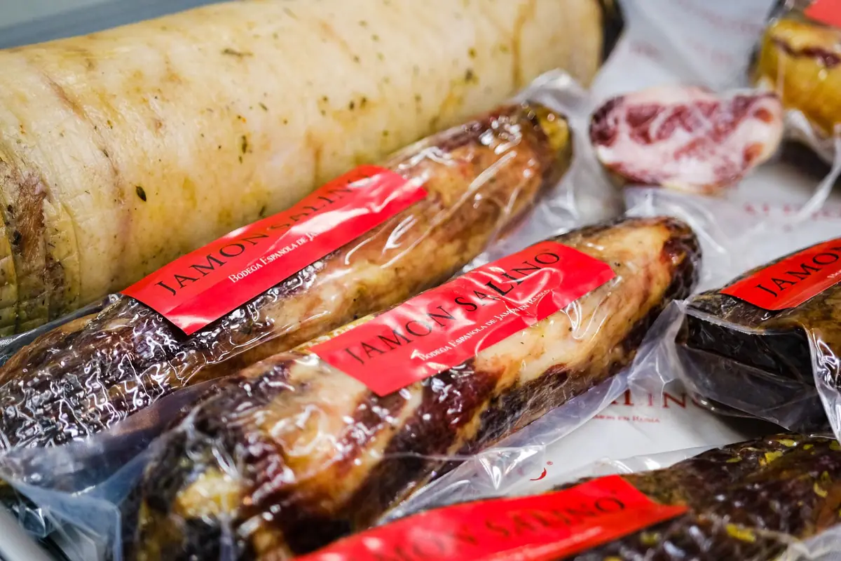 Cured meats in vacuum-sealed plastic packaging