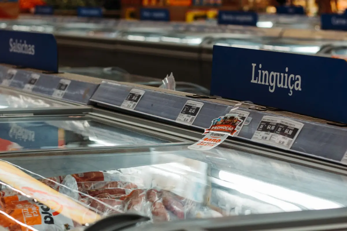 Frozen meats in an open-top chest-style freezer