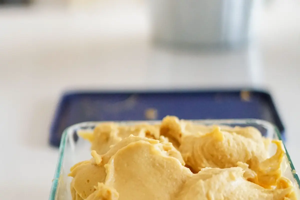 Homemade ice cream in a glass storage container