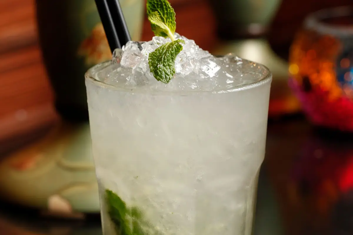 A mojito packed with crushed ice and a mint sprig